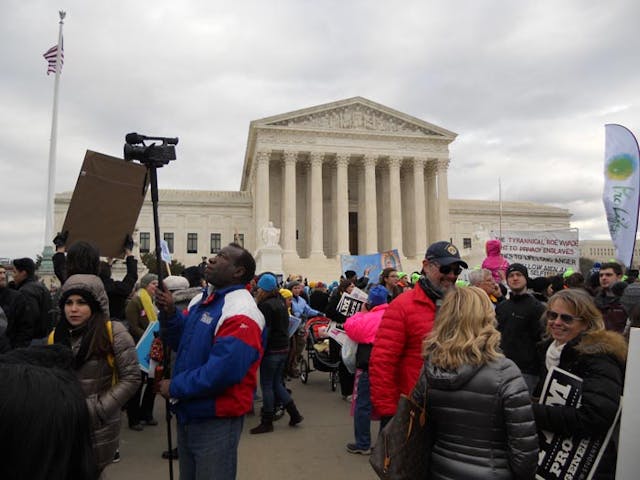 Pro-life protesters outside of the Supreme Court pro-life millennial women