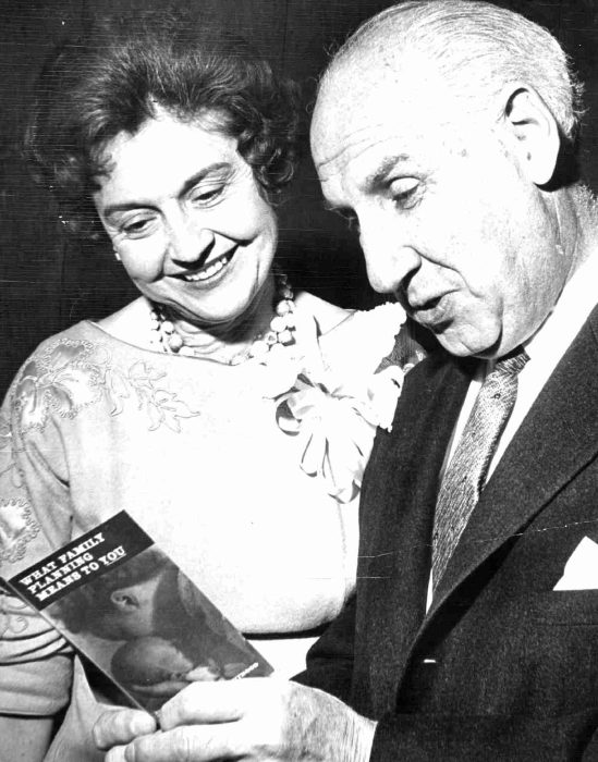FEB 6 1964, FEB 13 1964 Presidents Get Together Mrs. Wayne D. Williams of Denver, new president of the Planned Parenthood League of Colorado, reviews League pamphlet with Dr. Alan Guttmacher of New York, national president of Planned Parenthood, who spoke in Denver. Credit: Denver Post (Denver Post via Getty Images)