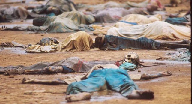 359329 08:Tutsi victims of a Hutu massacre lie outside the Rukara Catholic mission in Rukara, Rwanda May 12, 1994. One of the worst single massacre sites of the Rwandan genocide, Rukara saw 800 people die inside and around the church. (Photo by Scott Peterson/Liaison) Photojournalists have documented human atrocities – including abortion – for decades image