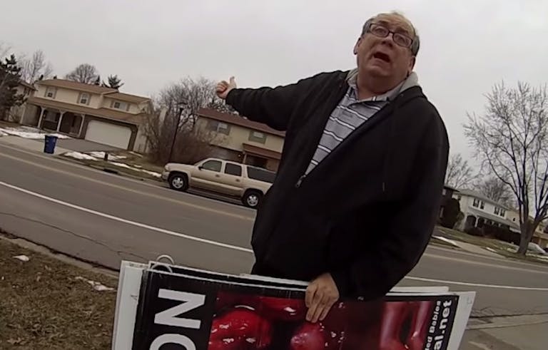 Beechcroft-abortion-sign-man