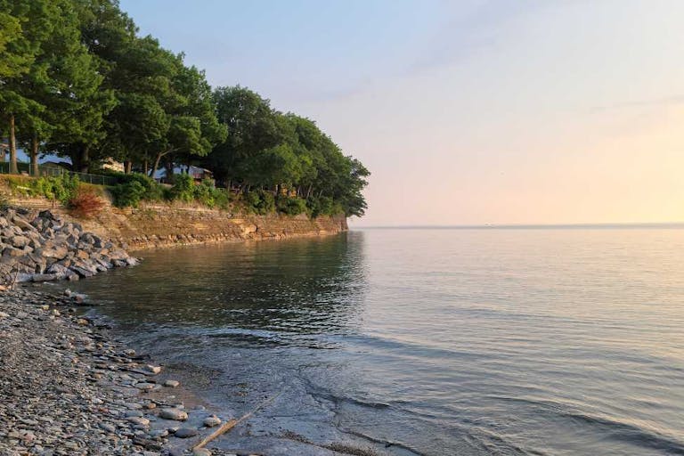 Rocky Shore Beach Along Lake Erie At Dusk