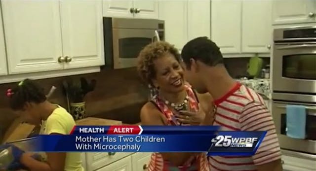 De Clercq and her children Andrea and Robbie work together in the kitchen in this screenshot from ABC.