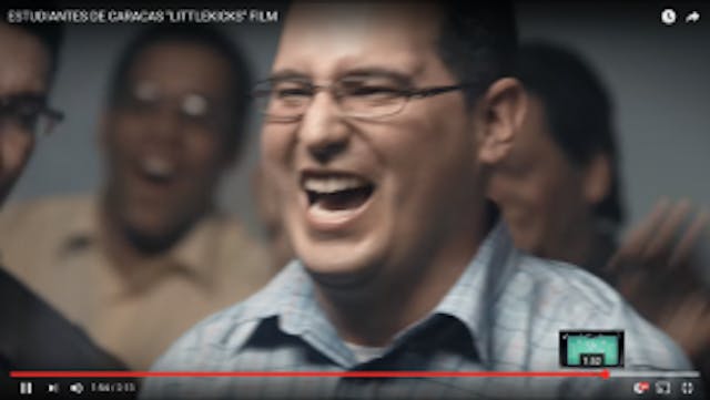 A father celebrates his preborn baby's soccer skills in this screen shot.