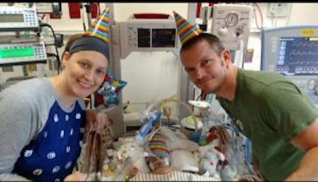 His parents celebrate Jonah's one month birthday. via Facebook.