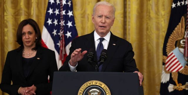 WASHINGTON, DC – MAY 20: U.S. President Joe Biden gestures during his remarks, as Vice President Kamala Harris looks on, before a signing ceremony for the COVID-19 Hate Crimes Act in the East Room of the White House on May 20, 2021 in Washington, DC… (Photo by Anna Moneymaker/Getty Images). Biden Harris