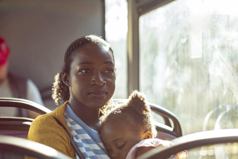 Mother and daughter in a bus
