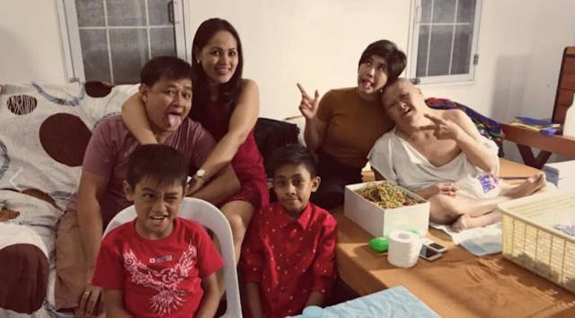 Photo via Facebook Daughter pens moving 50th birthday tribute to dad with Down syndrome image