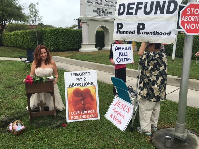 Julie Woodlee outside PP with prolife