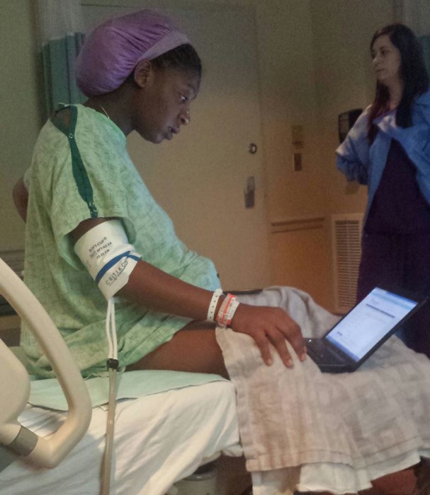 Collins taking her exam. Photo via Facebook.