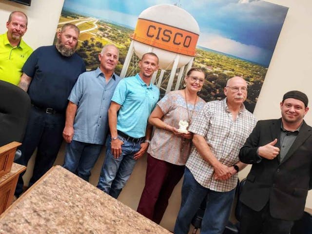 Right To Life of East Texas Director Mark Lee Dickson takes a picture with Cisco City Council after the historic vote (Photo: Mark Lee Dickson)