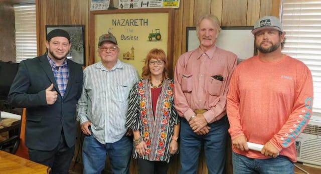 Right To Life of East Texas Director Mark Lee Dickson takes a picture with the Nazareth City Council and area resident Jeanie Birkenfeld after the historic vote. (Photo: Mark Lee Dickson)
