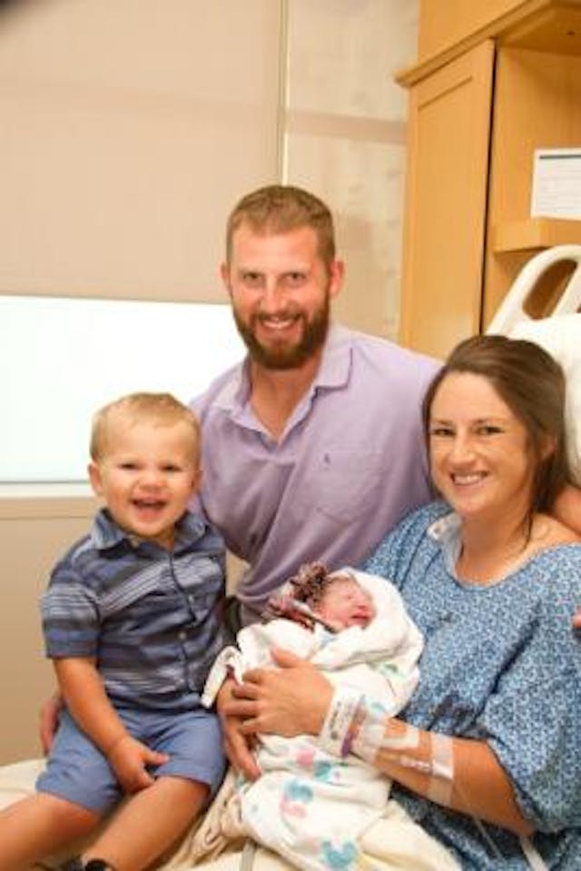 Family of four. The Shnurman family celebrate baby Lilah’s birth. Photo via Caring Bridge. via Caring Bridge