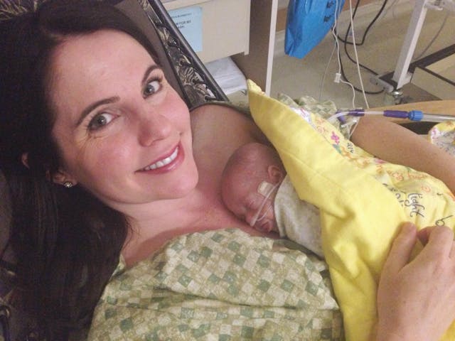 Angela Bakker and baby Naomi. The Kangaroo hold is a common way to help preemies and newborns thrive. Photo by Emily Loftus.