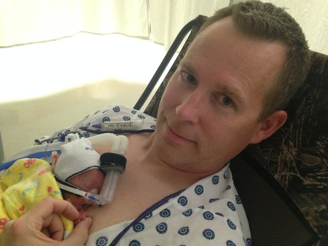 Michael Bakker holds baby Naomi. Photo by Emily Loftus. Michael Bakker holds baby Naomi. Photo by Emily Loftus.