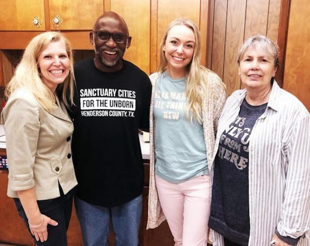 Former Poynor School Teacher Lynne Littrell, Sanctuary Cities For the Unborn Ambassador Joel Enge, Poynor Resident Cassie Marsh, and Poynor Mayor Dannie Smith take a picture after the unanimous vote of the Poynor City Council. (Photo: Mark Lee Dickson) Former Poynor School Teacher Lynne Littrell, Sanctuary Cities For the Unborn Ambassador Joel Enge, Poynor Resident Cassie Marsh, and Poynor Mayor Dannie Smith take a picture after the unanimous vote of the Poynor City Council. (Photo: Mark Lee Dickson)