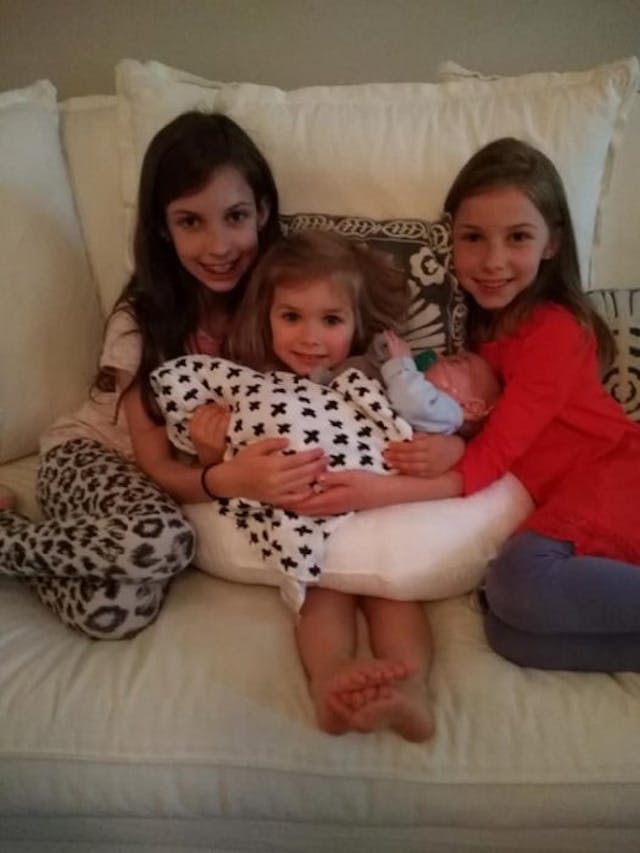 Baby Benson and his three big sisters celebrate his release from the hospital after his premature birth. Baby Benson and his three big sisters celebrate his release from the hospital after his premature birth.