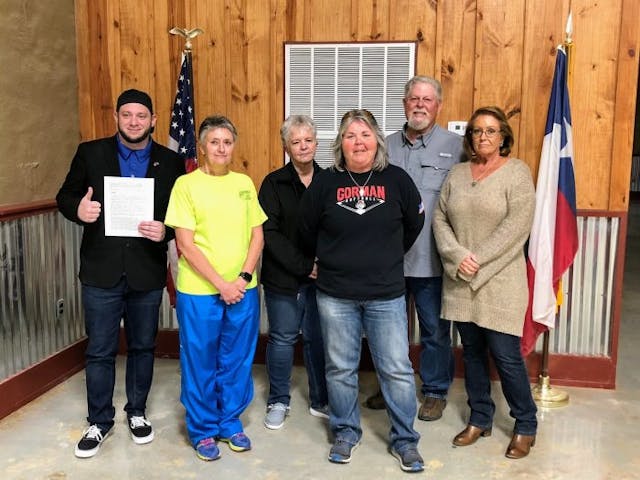 Photo: Right to Life of East Texas Director Mark Lee Dickson takes a picture with the Gorman City Commissioners and Mayor David Perry after the Gorman City Commissioner’s Meeting (Photo: Mark Lee Dickson)