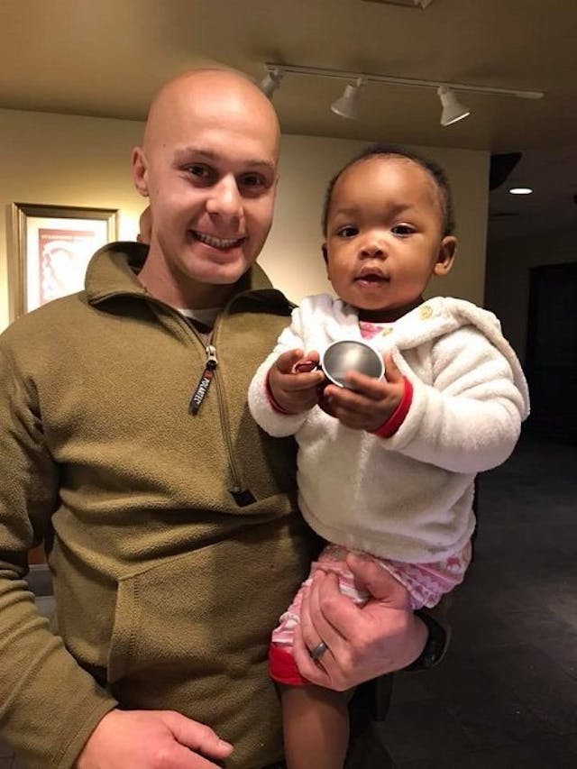 State troopers turned into babysitters when a Starbucks employee lost her childcare for the day. Photo via Facebook. Helping women