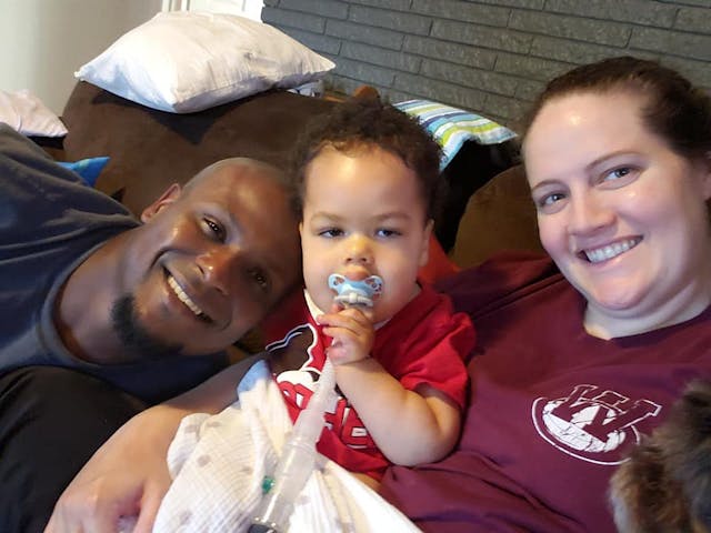 Axel and his parents. Via Facebook. spinal muscular atrophy