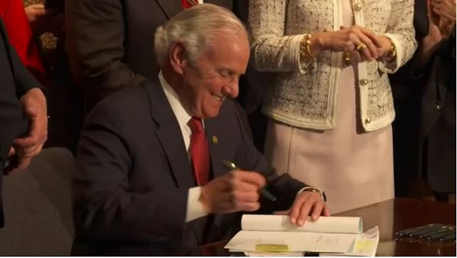 Screenshot WCSC. Gov. McMaster signs “heartbeat bill.” South Carolina governor signs ‘heartbeat bill’ as Planned Parenthood prepares lawsuit image