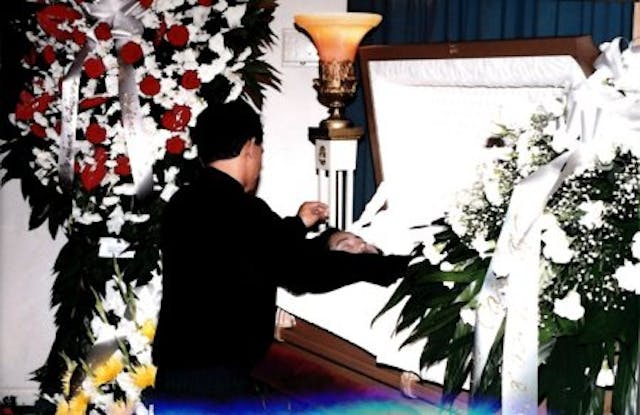 Husband of woman killed from legal abortion over her casket. Husband of woman killed from legal abortion over her casket.