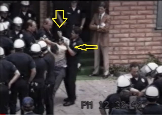 Police use nunchakus and break arm of peaceful pro-life activist (Image Credit: The Brutal Truth) Image: Police use nunchakus and break arm of peaceful pro-life activist (Image Credit: The Brutal Truth)