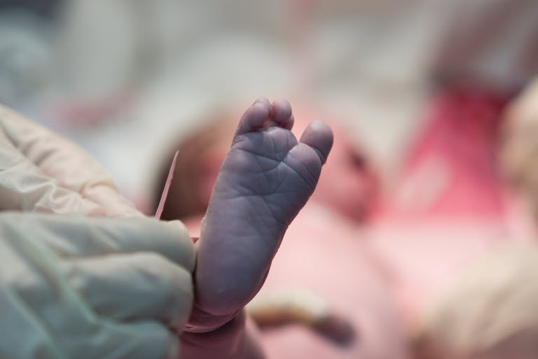Feet of a newborn baby