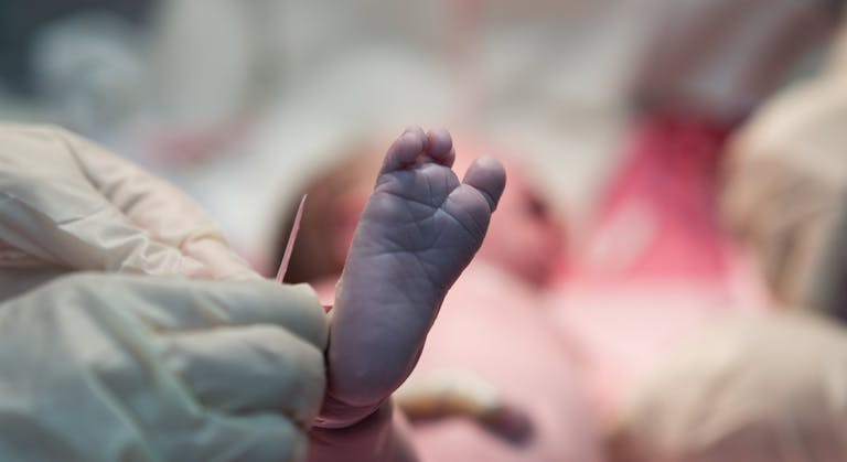 Feet of a newborn baby