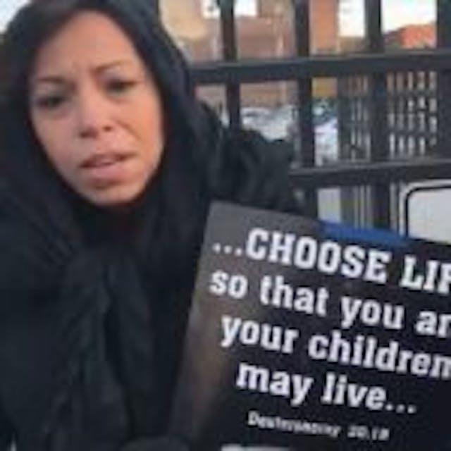Black women pray outside Planned Parenthood Bishops and pastors gather at Missouri Planned Parenthood to condemn Black genocide image