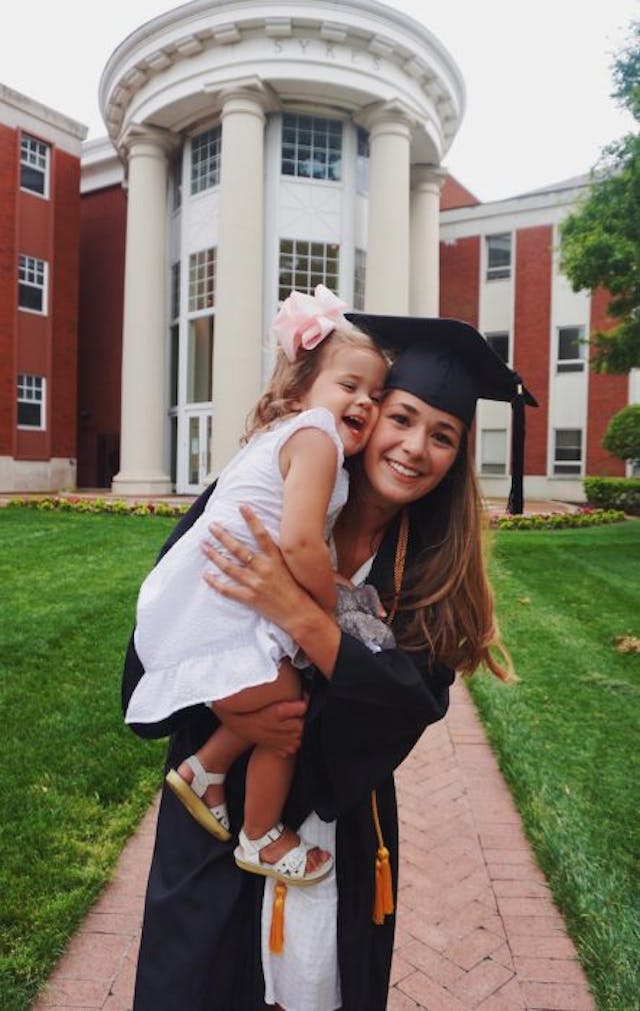 A graduate and her daughter. A graduate and her daughter.