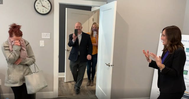 Sarah is overcome with emotion upon seeing Ashley Bratcher while InnerVisions staff members look on (Photo: Lisa Bourne) Sarah is overcome with emotion upon seeing Ashley Bratcher while InnerVisions staff members look on (Photo: Lisa Bourne)