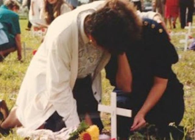 Michele Herzog grieves her abortions at a pro-life memorial. (Photo by Carole Novielli) Michele Herzog grieves her abortions at a pro-life memorial. (Photo Credit: Carole Novielli)