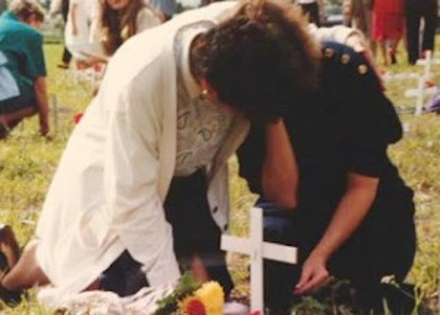 Michele Herzog grieves her abortions at a pro-life memorial. (Photo Credit: Carole Novielli)