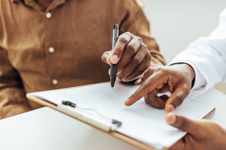 Man having a visit at male doctor’s office