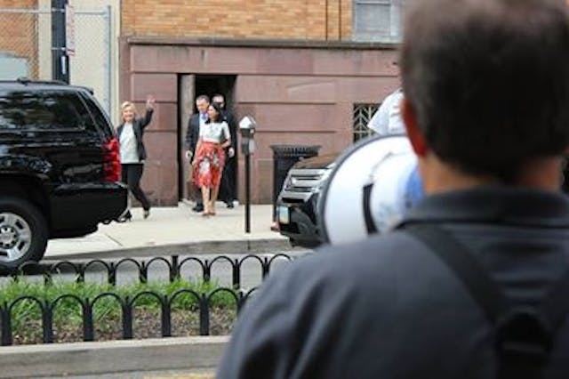 (Photo via Mark Harrington’s Facebook page) prolife greets Hillary COlumbus920_4673263899512056954_n