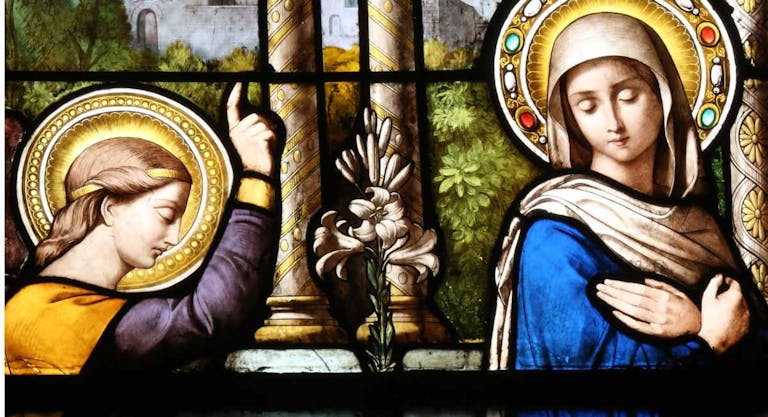 Basilica Notre-Dame of Geneva. Stained glass window. The Annunciation. The announcement by the angel Gabriel to the Virgin Mary that she would become the mother of Jesus.