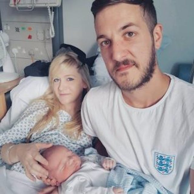 Charlie and his parents after his birth. photo via GoFundMe page