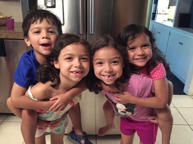Anna and Mercy with their younger twin siblings, Creed and Cadence