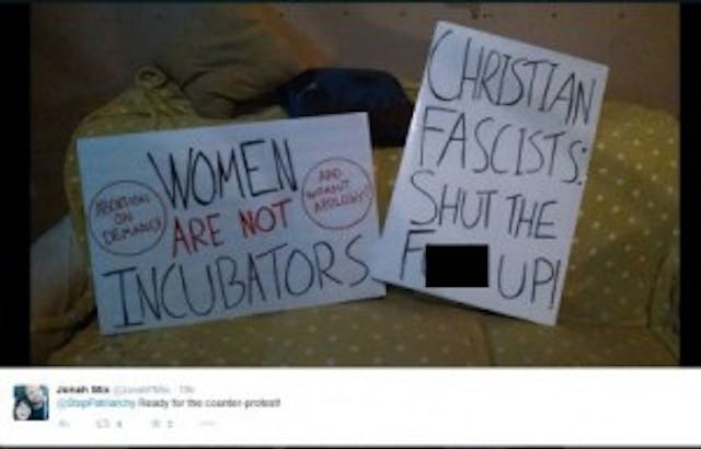 Stop Patriarchy protest signs