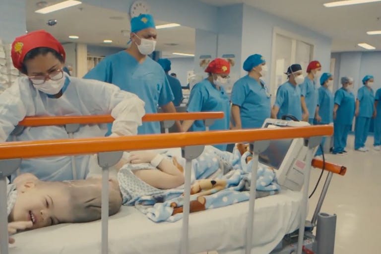 conjoined twins, independent screenshot (logo on top right of pic)