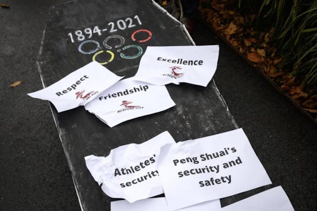 A coffin is displayed in front of the International Olympic Committee (IOC) headquarters during a protest by Tibetan activists against the February’s Beijing 2022 Winter Olympics, on November 26, 2021 in Lausanne. – Human rights campaigners and exiles accuses Beijing of religious repression and massively curtailing rights in Tibet. (Photo by Fabrice COFFRINI / AFP) (Photo by FABRICE COFFRINI/AFP via Getty Images)