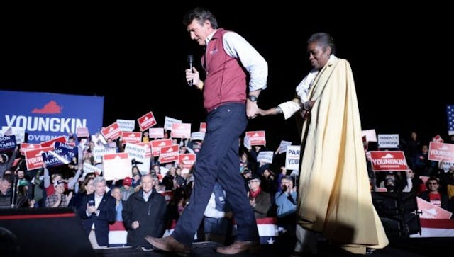 LEESBURG, VIRGINIA – NOVEMBER 01: Virginia Republican gubernatorial candidate Glenn Youngkin leads Virginia Republican candidate for Lieutenant Governor Winsome Sears onstage at a campaign rally at the Loudon County Fairground on November 01, 2021 in Leesburg, Virginia. The Virginia gubernatorial election, pitting Youngkin against Democratic candidate, former Virginia Gov. Terry McAuliffe, is tomorrow. (Photo by Anna Moneymaker/Getty Images) Winsome Sears