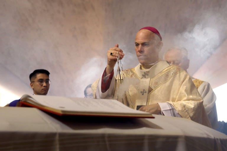 Archbishop of San Francisco, the Most Reverend Salvatore J. Cordileone leads the prayer of commendation during the funeral Mass of archbishop emeritus and Cardinal William Joseph Cardinal Levada at the Cathedral of Saint Mary on Thursday, Oct. 24, 2019, i
