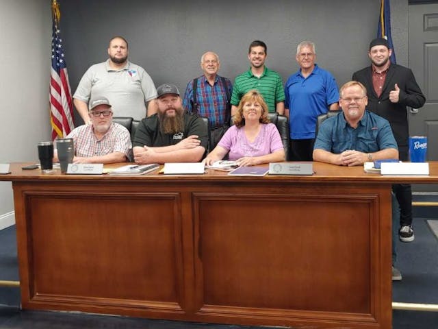 Right To Life of East Texas Director Mark Lee Dickson and Pro-Life Waco Director John Pisciotta pictured with Crawford community leaders and the Crawford City Council (Photo: Mark Lee Dickson) Sanctuary city