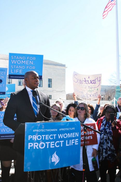Jonathan Alexandre speaks at the rally.