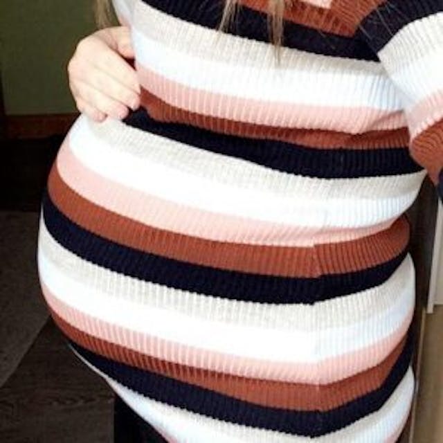 O’Hara showed off her baby bump in her heartbreaking Facebook letter. via Facebook