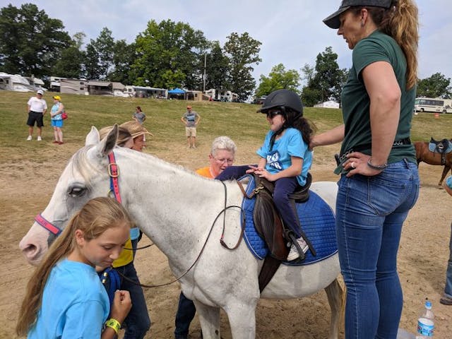 Faith, who has Trisomy 18, loves riding horses. Photo courtesy of Smith family. Trisomy 18, abortion, kids with disabilities