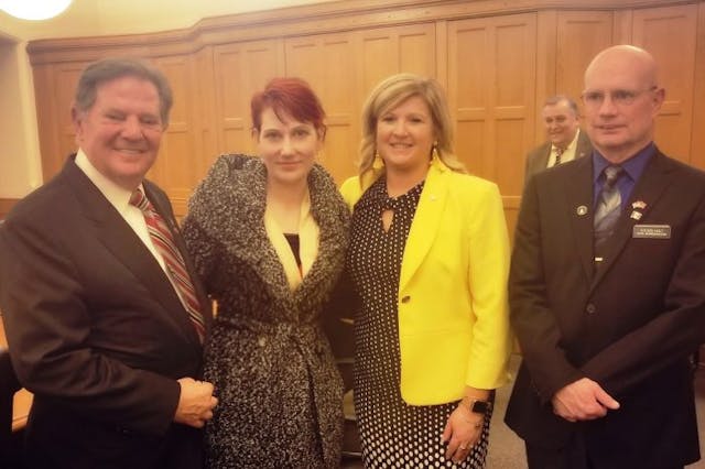 Jennifer Christie with Tom Delay and Iowa State Representatives Shannon Lundgren and Steven Holt Jennifer's son was conceived in rape.