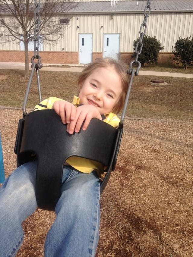 Kyle, who was born with spina bifida after his parents refused abortion, enjoys swinging outside. Photo courtesy of the Wells family chose life