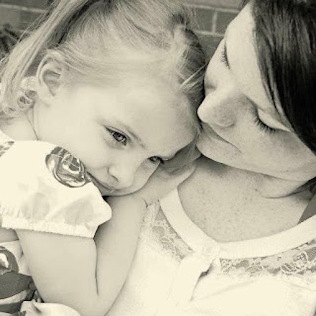 Heather Hobbs holds her daughter who was born after Hobbs refused abortion.